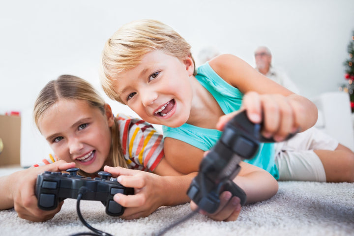 Children Enjoying Fully Loaded Gaming Systems Ready to Play