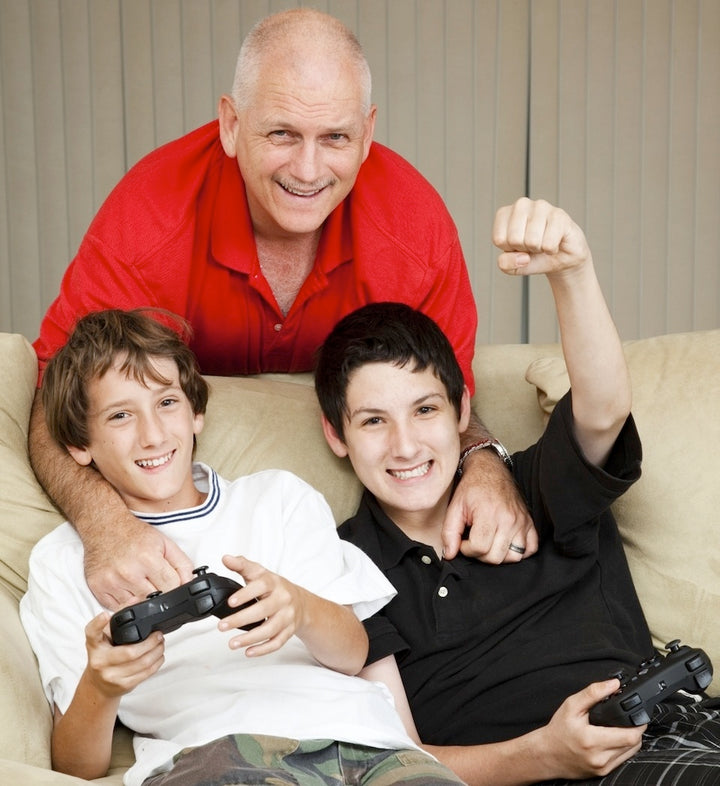 Family Having Fun with a Fully Loaded Gaming System