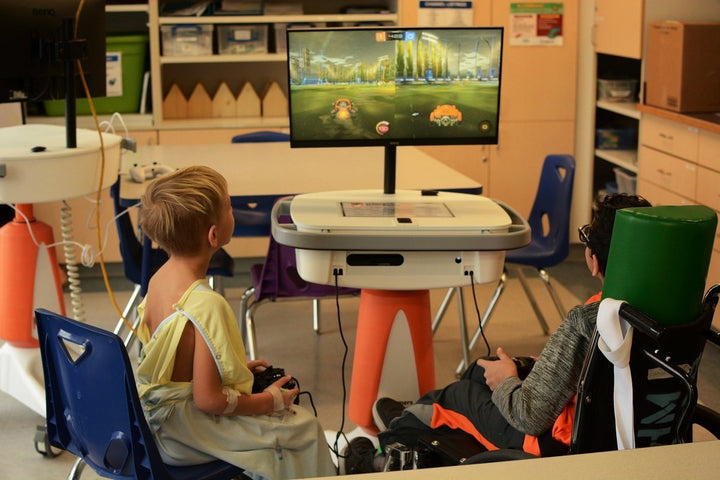 Children Playing with Fully Loaded Gaming Systems